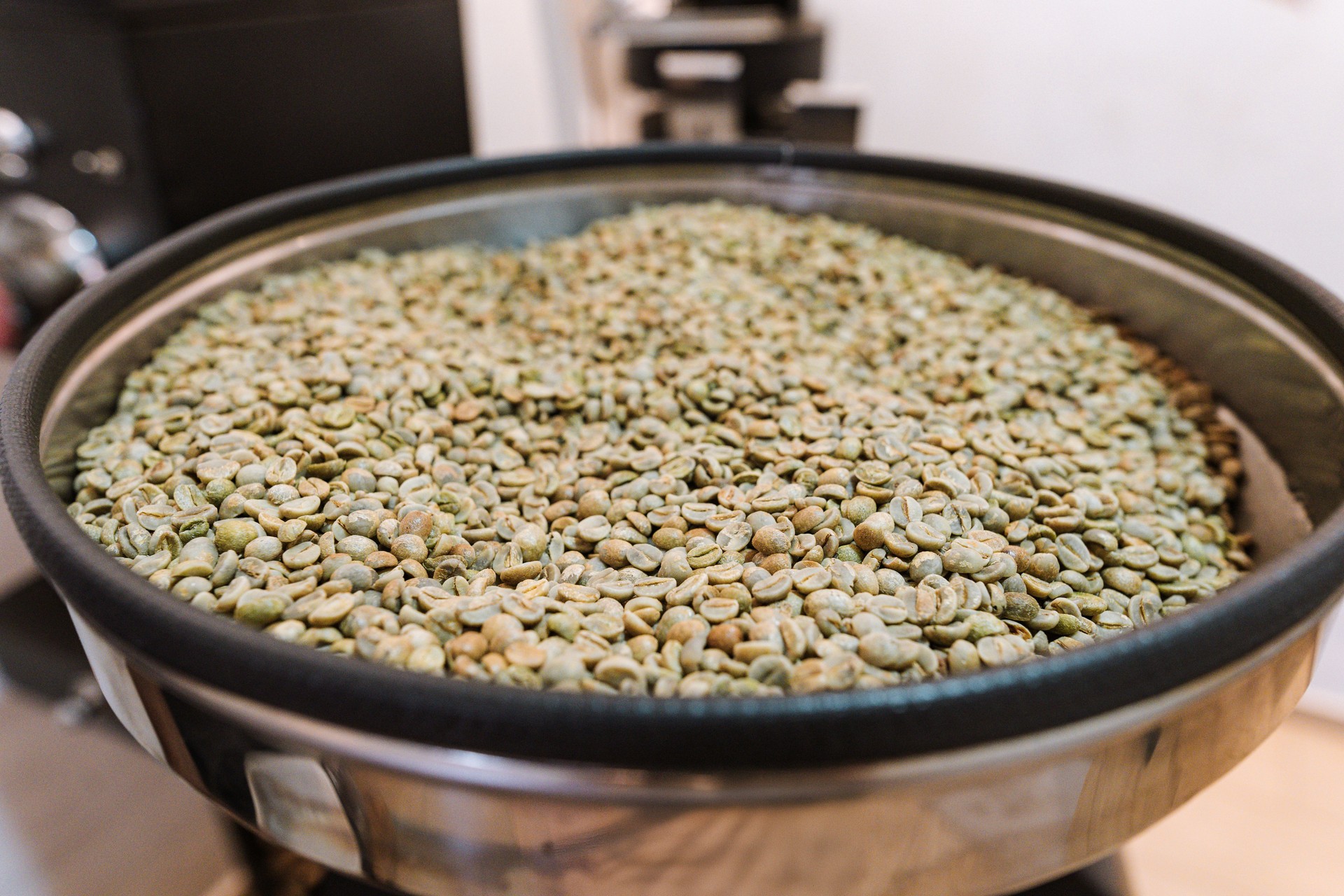 Green coffee beans ready to be roasted in the machine